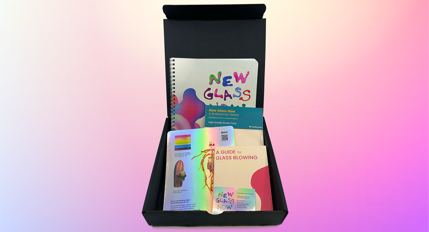 Wide view of the New Glass Now museum catalog and packaging materials showcasing graphics and typography inspired by glass art.